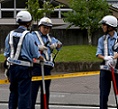 Police officers guard the main gate to the Tsukui Yamayuri En care centre where a knife-wielding man went on a rampage in the city of Sagamihara, Kanagawa prefecture, some 50 kms (30 miles) west of Tokyo on July 26, 2016.
At least 19 people were killed when the man went on a rampage at the care centre for the mentally disabled in Japan early on July 26, a fire official said. / AFP / TOSHIFUMI KITAMURA        (Photo credit should read TOSHIFUMI KITAMURA/AFP/Getty Images)